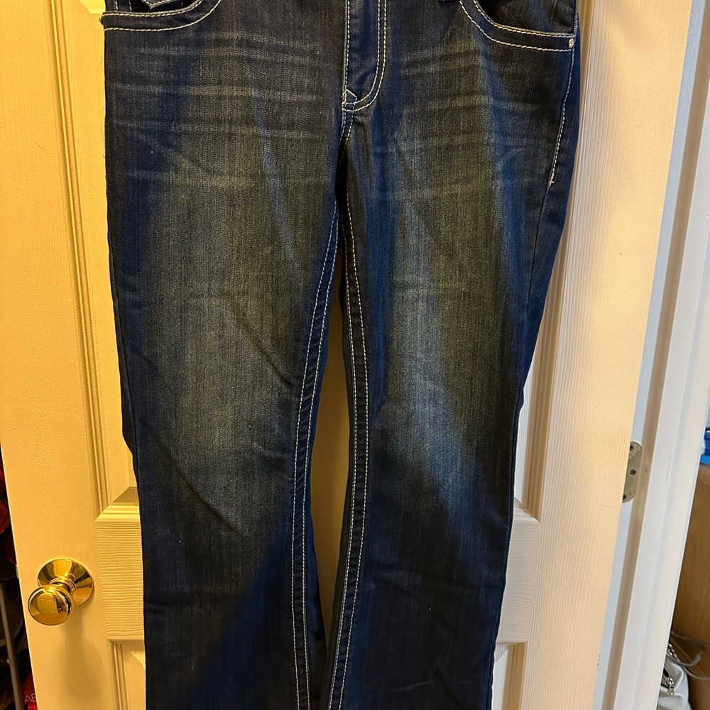 Size 8, INC JEANS. Curvy Fit. Boot Leg. Embellished buttons.